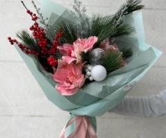 Surprize florale de Crăciun – emoție și eleganță în fiecare buchet!